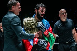 Chingiz Allazov with the ONE Featherweight Kickboxing World Title