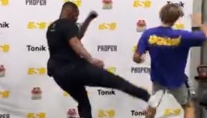 Jon Jones kicking a fan